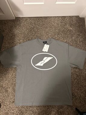 WE11done with White Oval Logo